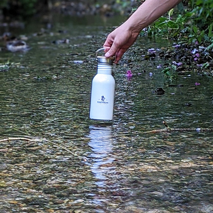 water bottle in a stream in Saffron Walden